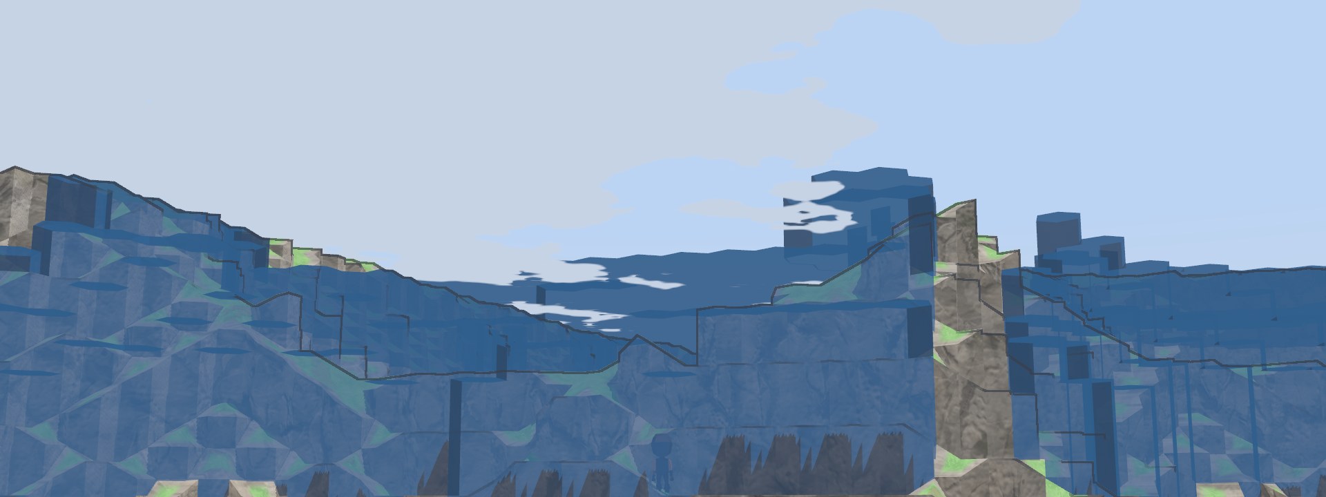 A world under water: translucent blue walls and sheets standing over cliffs and hills